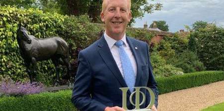 Director of Tees collecting legal 500 award