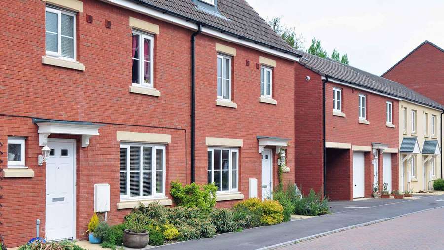 Row of red brick houses - Residential property economic review Feb 24