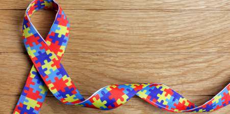 the autism logo on a scarf