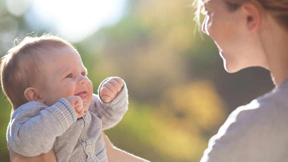 Mother playing with her baby - cerebral palsy article