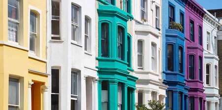 Brightly coloured terrace houses in a row