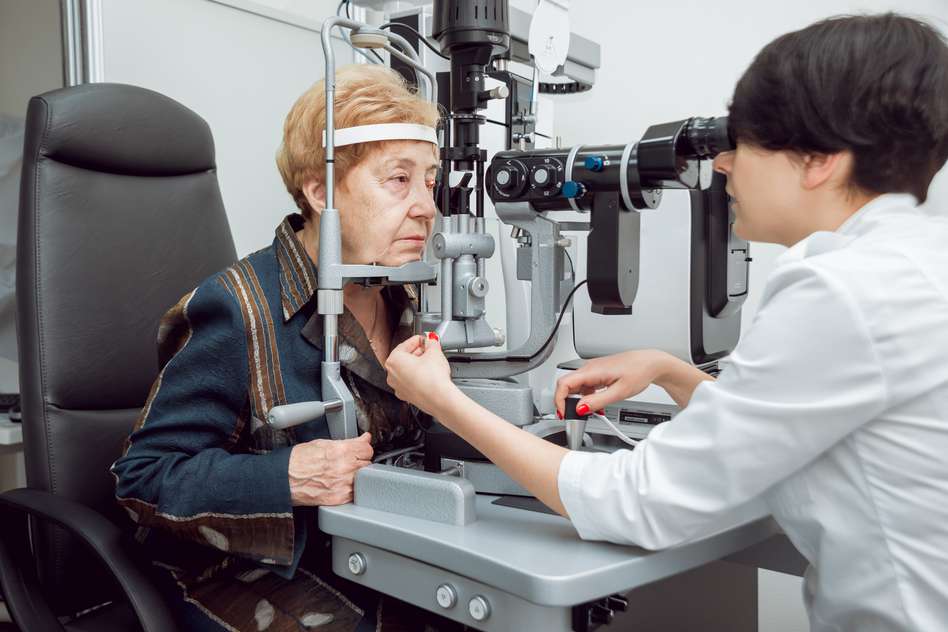 a doctor performing an eye scan