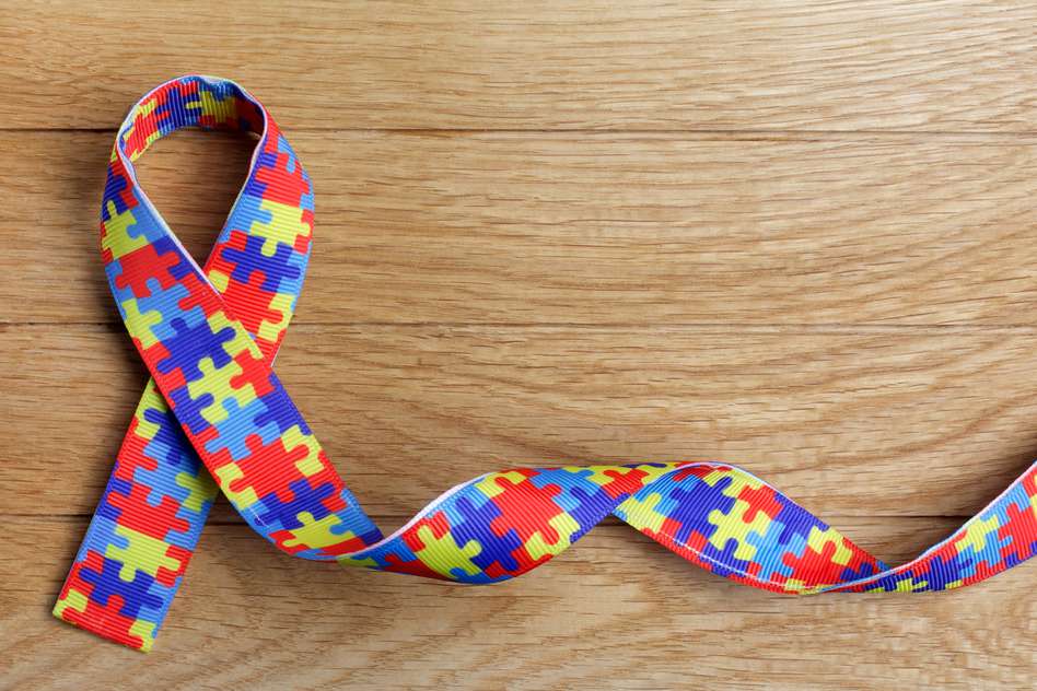 the autism logo on a scarf