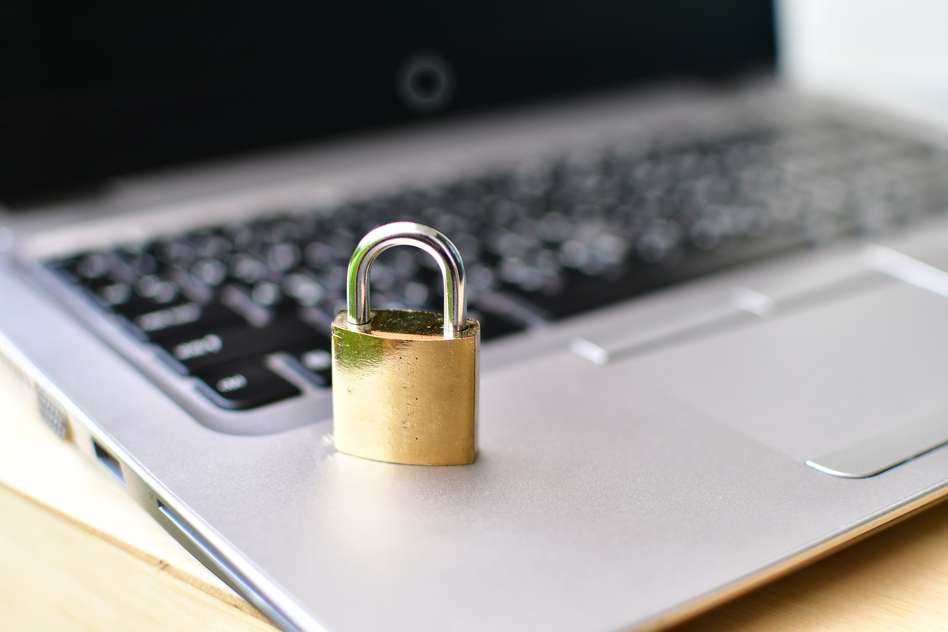 a lock on a laptop representing computer security